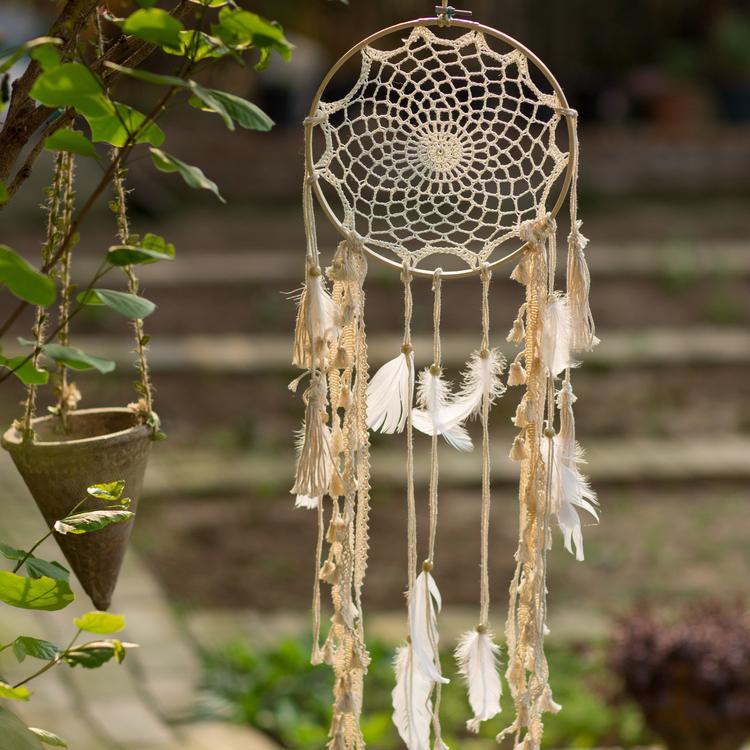 Handmade Indiana Dream Catcher Net featuring natural feathers, wood, and leather in various styles and colors.