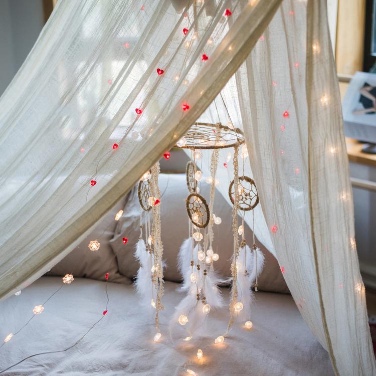 Handmade Indiana Dream Catcher Net featuring natural feathers, wood, and leather in various styles and colors.