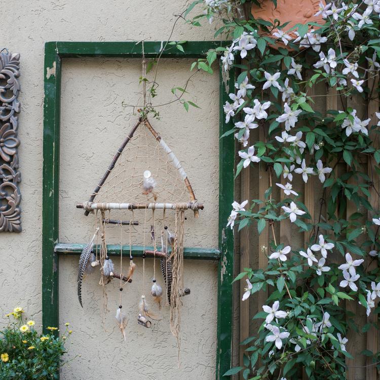 Handmade Indiana Dream Catcher Net featuring natural feathers, wood, and leather in various styles and colors.