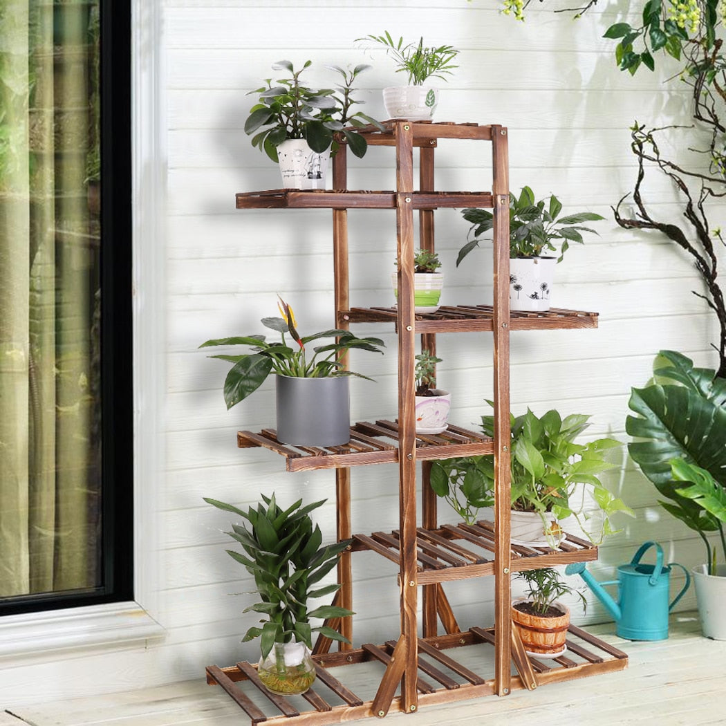 Indoor 6 tier wooden plant stand showcasing various plants, made of solid pine wood, perfect for home decor.