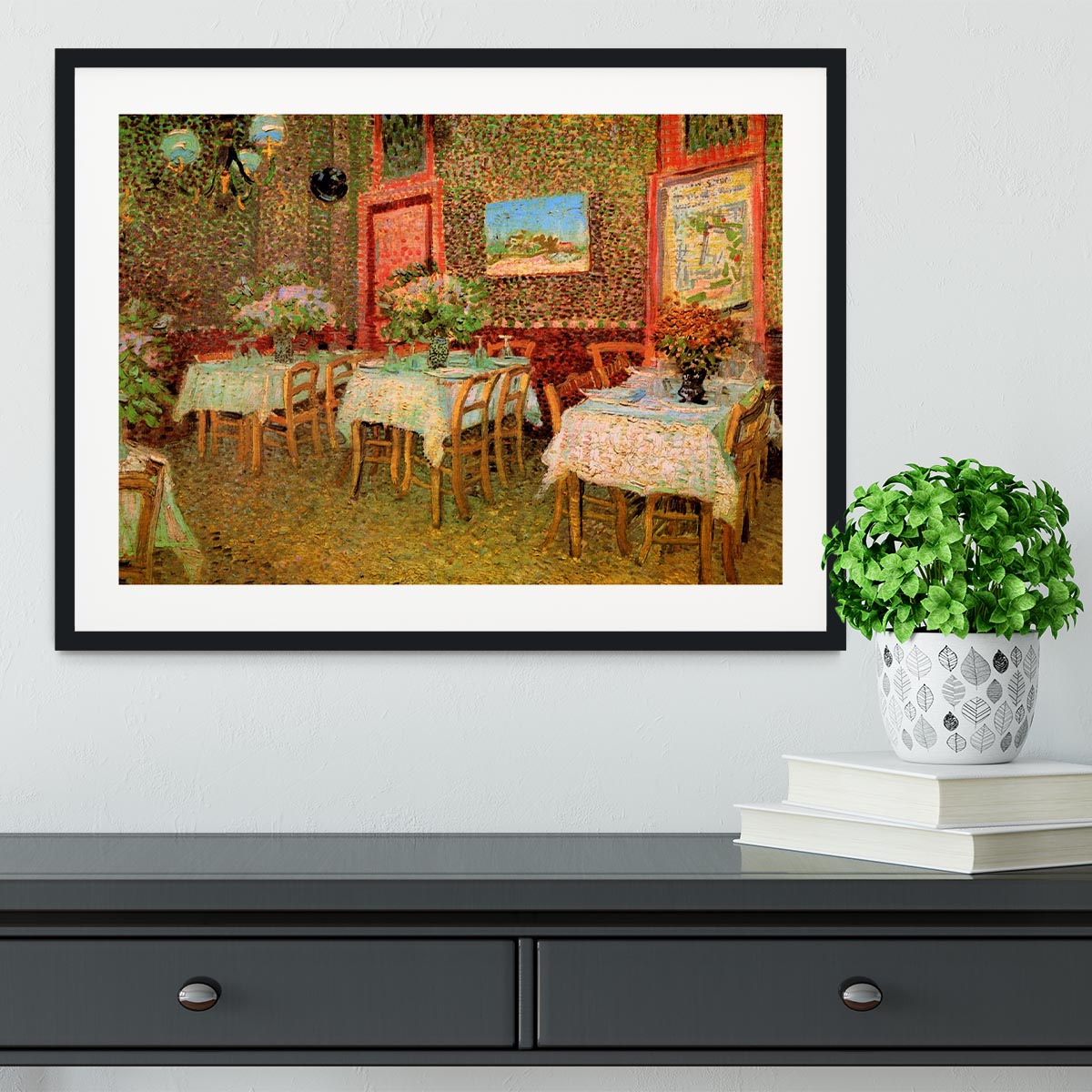 Framed print of Van Gogh's 'Interior of a Restaurant' showcasing vibrant colors and intricate details.