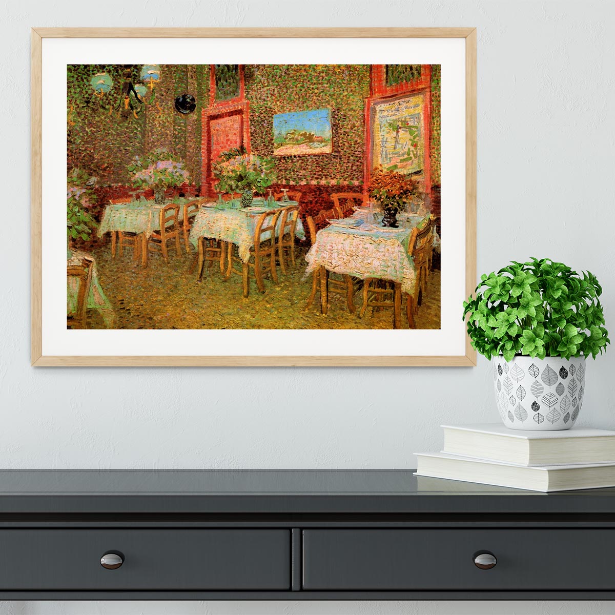 Framed print of Van Gogh's 'Interior of a Restaurant' showcasing vibrant colors and intricate details.