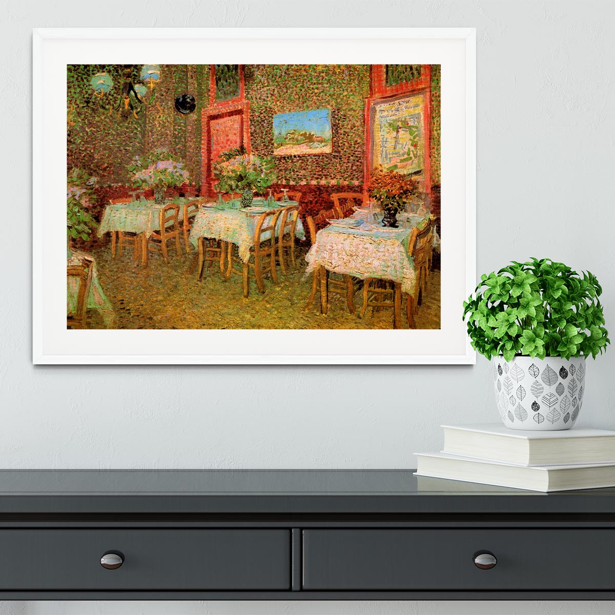 Framed print of Van Gogh's 'Interior of a Restaurant' showcasing vibrant colors and intricate details.