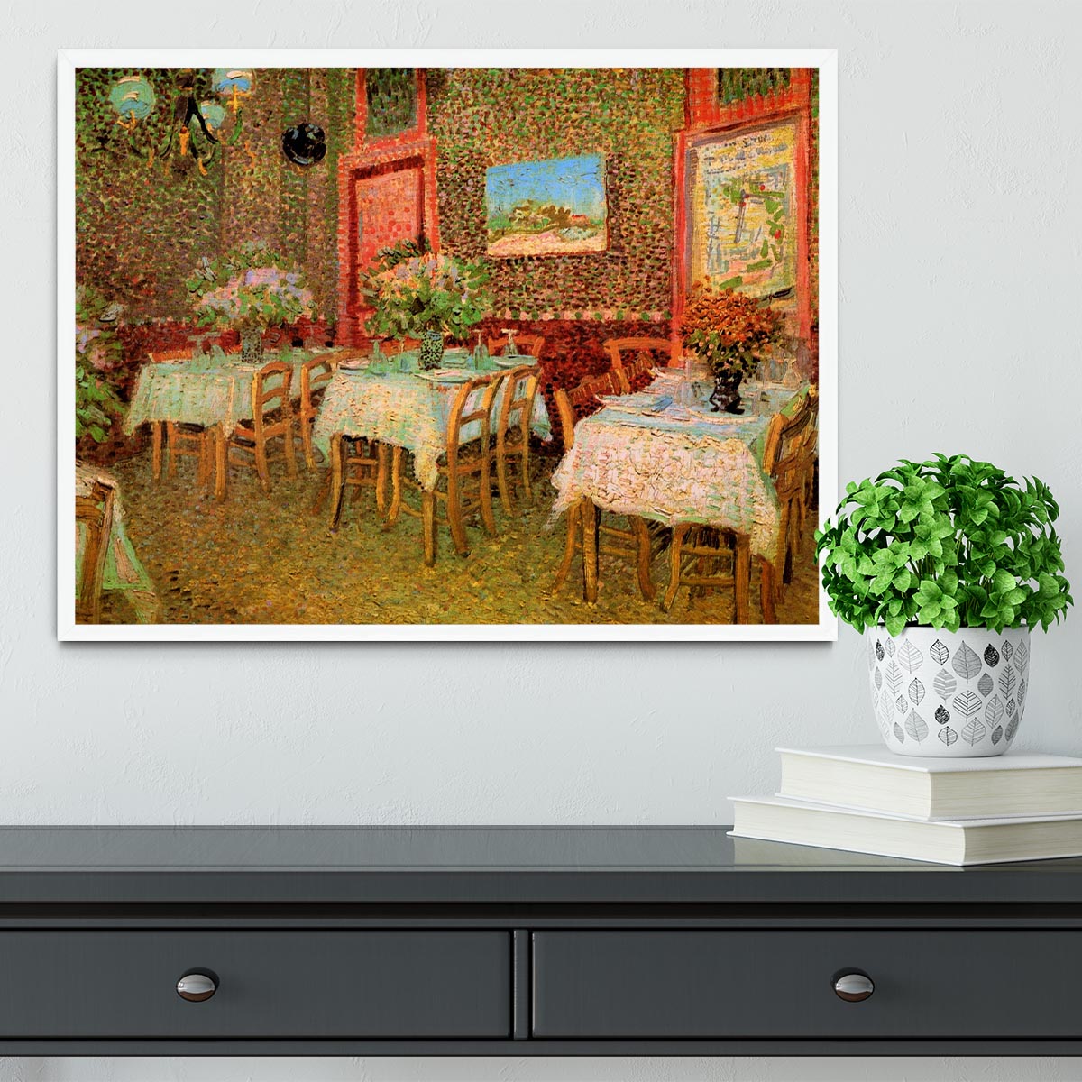 Framed print of Van Gogh's 'Interior of a Restaurant' showcasing vibrant colors and intricate details.