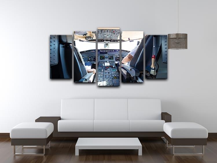 A stunning 5-panel canvas artwork depicting the interior of an airplane cockpit, showcasing intricate details and vibrant colors.