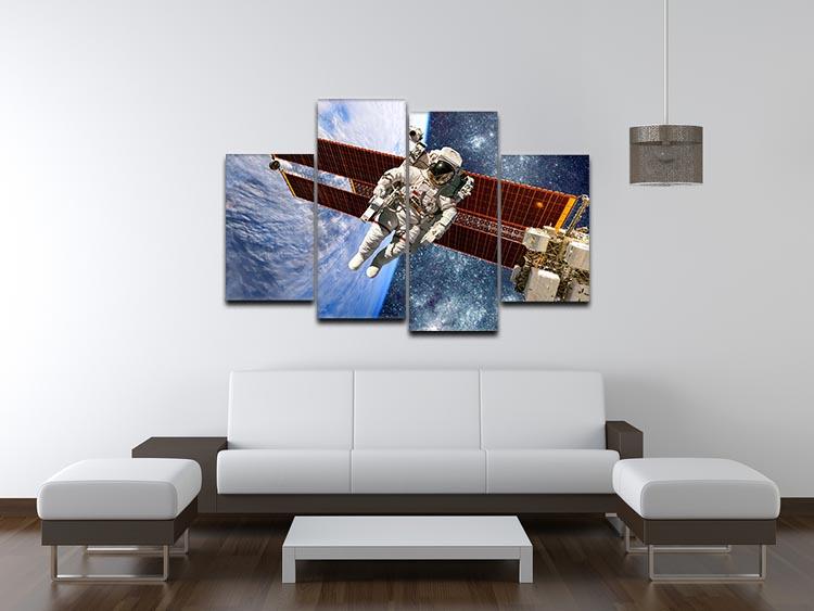 A 4-panel canvas artwork featuring the International Space Station and astronauts, showcasing a dynamic space exploration theme.