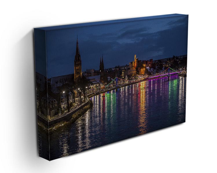 A beautiful canvas print of Inverness at night, showcasing a serene landscape with twinkling stars and city lights reflecting on the water.