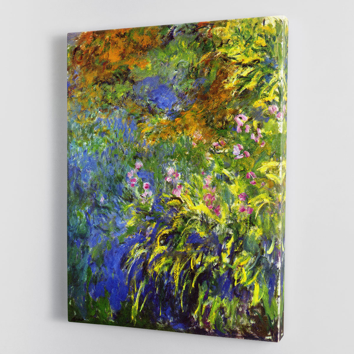 Canvas print of Iris at the Sea Rose Pond 2 by Monet, showcasing vibrant irises and serene water lilies in a beautiful garden setting.