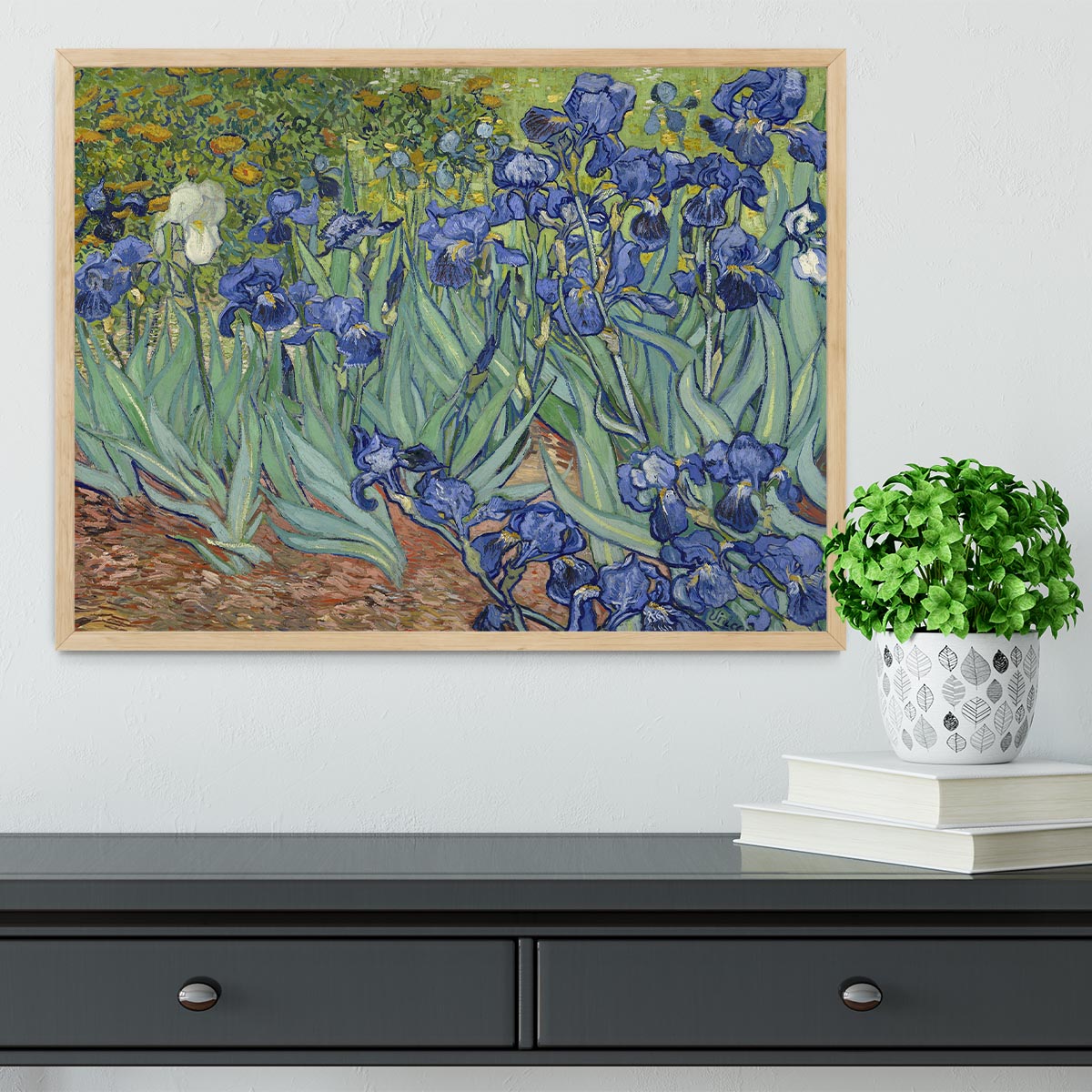 Framed print of Van Gogh's Irises artwork, showcasing vibrant colors and intricate details in a stylish frame.