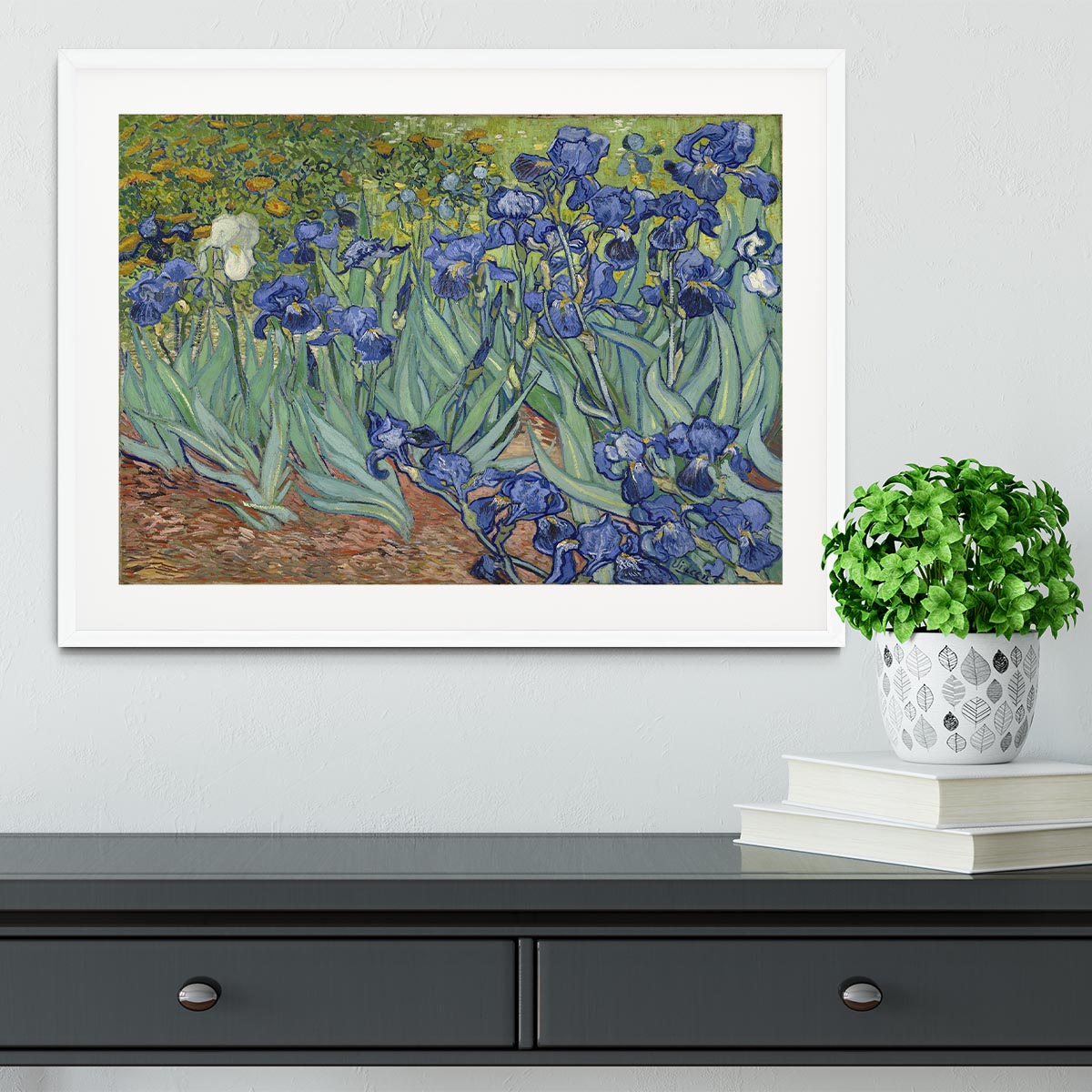 Framed print of Van Gogh's Irises artwork, showcasing vibrant colors and intricate details in a stylish frame.