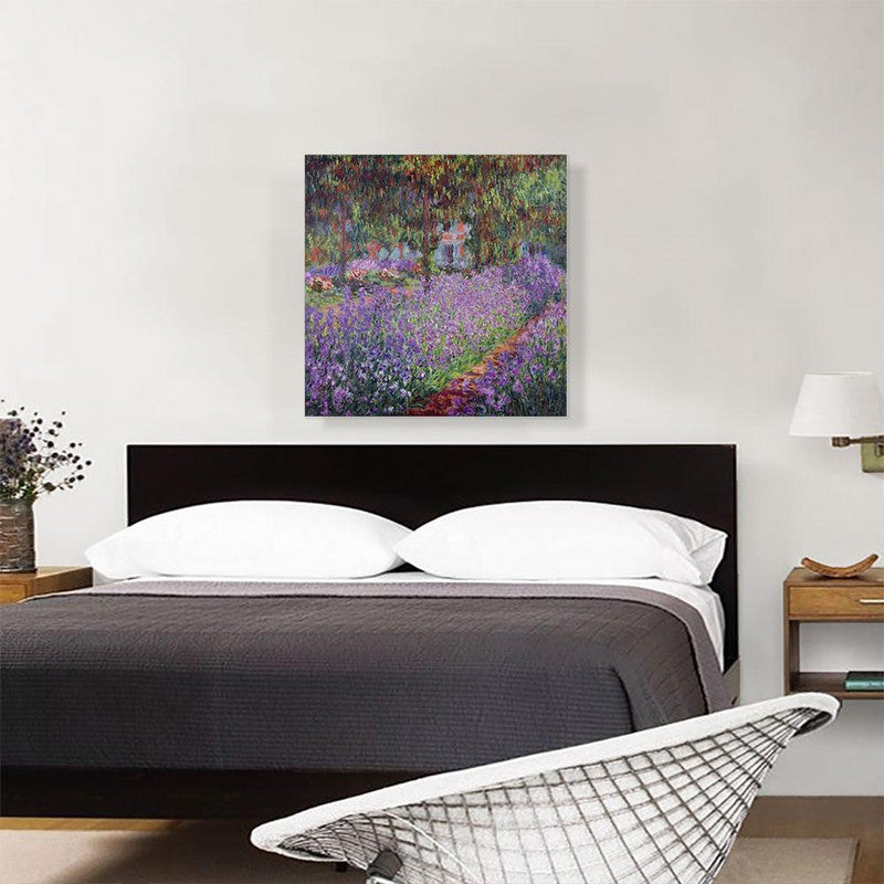 A vibrant canvas print of 'Irises In Monet's Garden' showcasing colorful irises in a lush garden setting.
