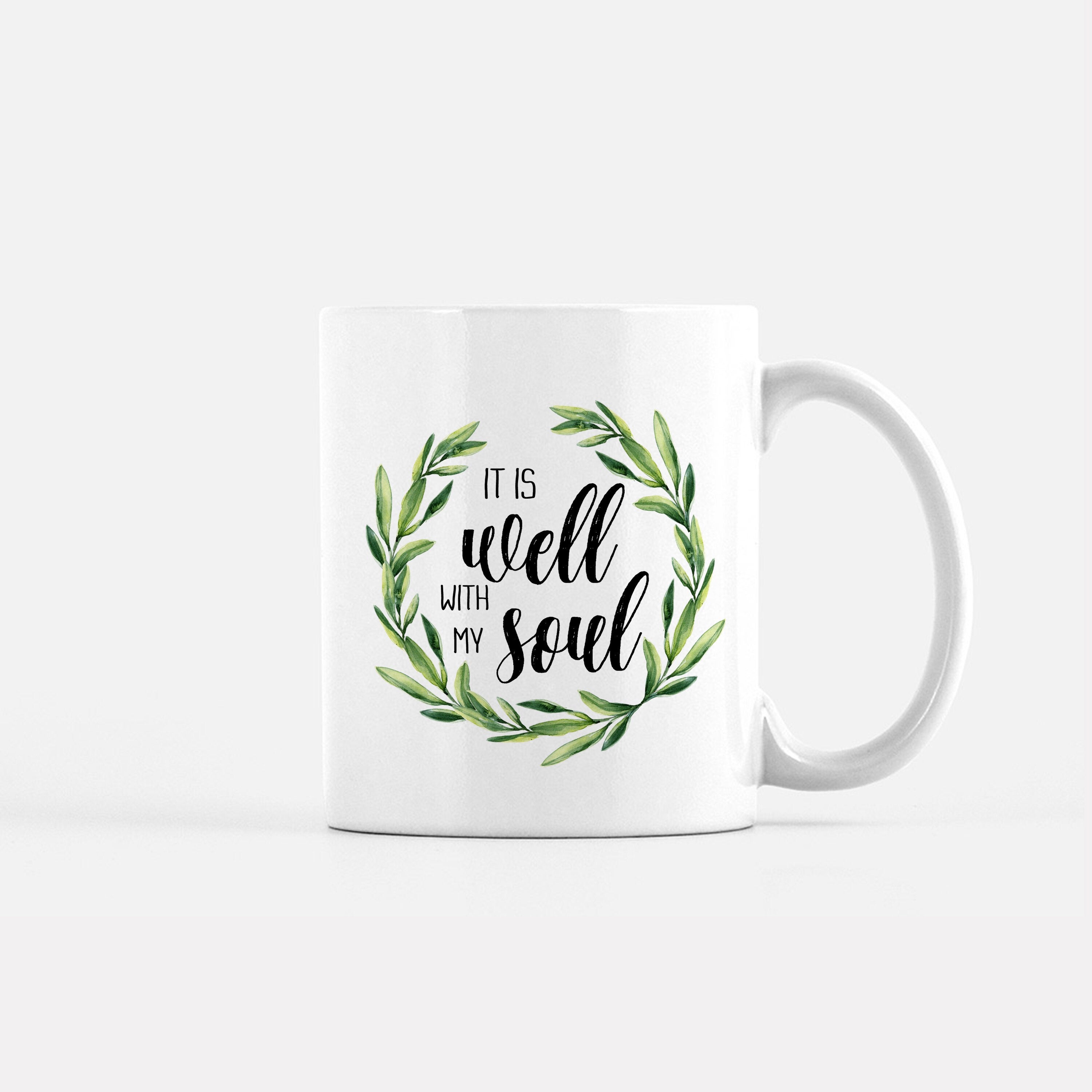 It Is Well with My Soul Coffee Mug featuring a blue wreath design, perfect for inspirational gifting.