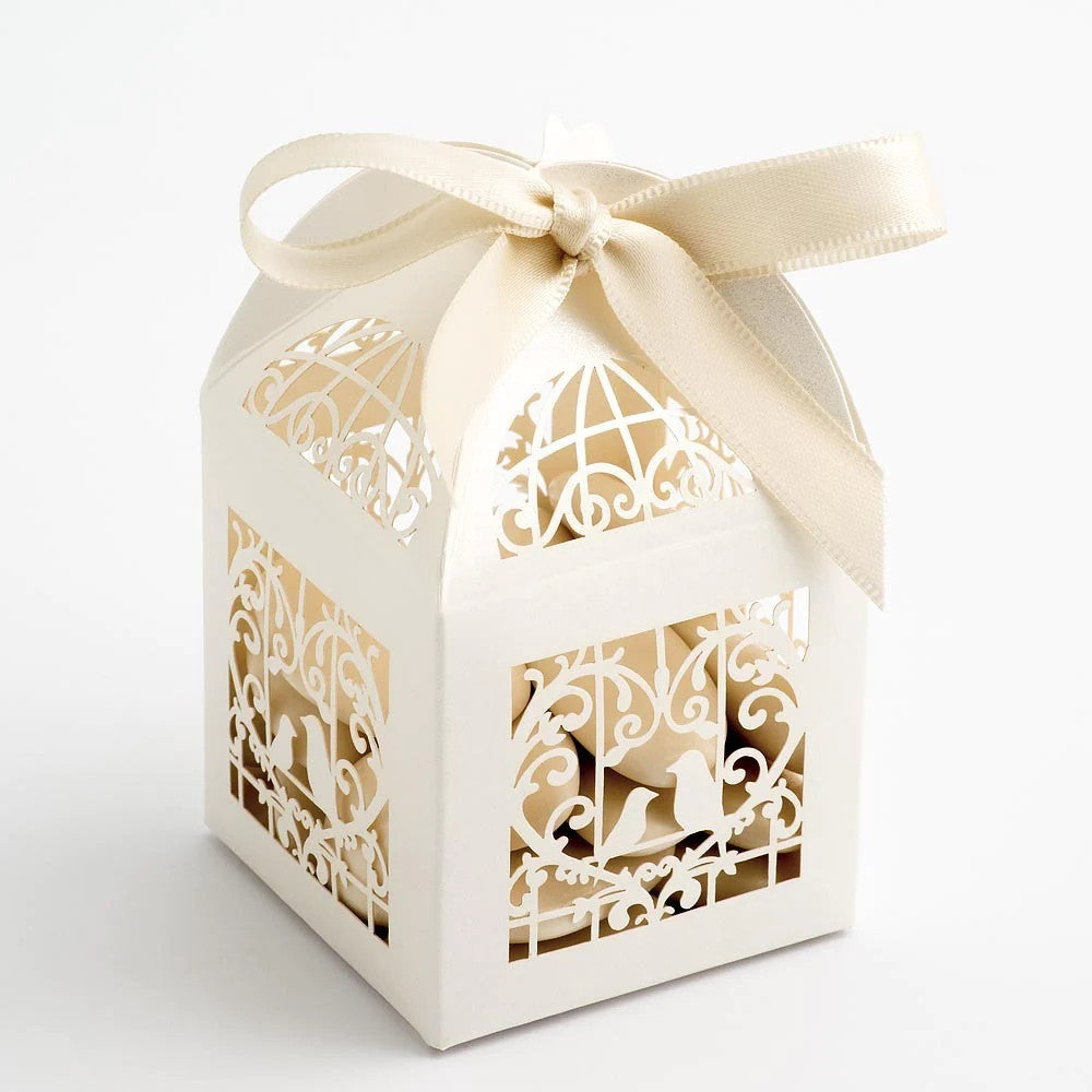 A pack of 10 ivory dove bird boxes designed for wedding favors, featuring a heart shape and elegant design.