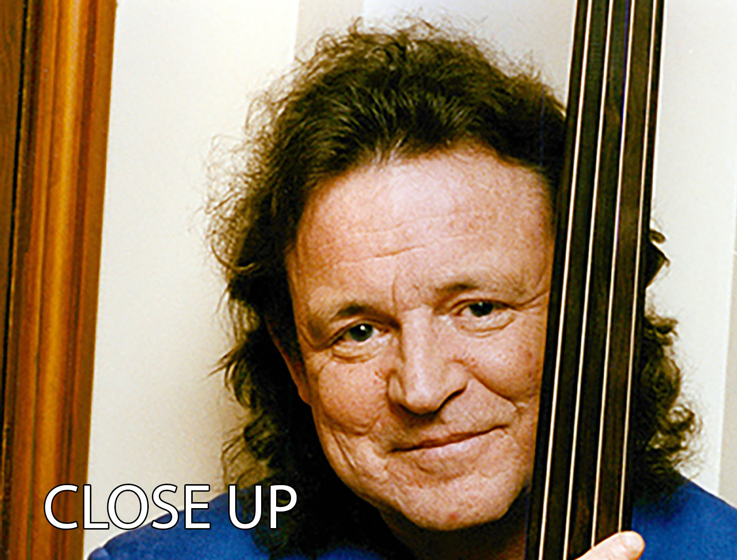 Three-panel canvas print featuring Jack Bruce, the legendary bass player from Cream, showcasing vibrant colors and artistic design.