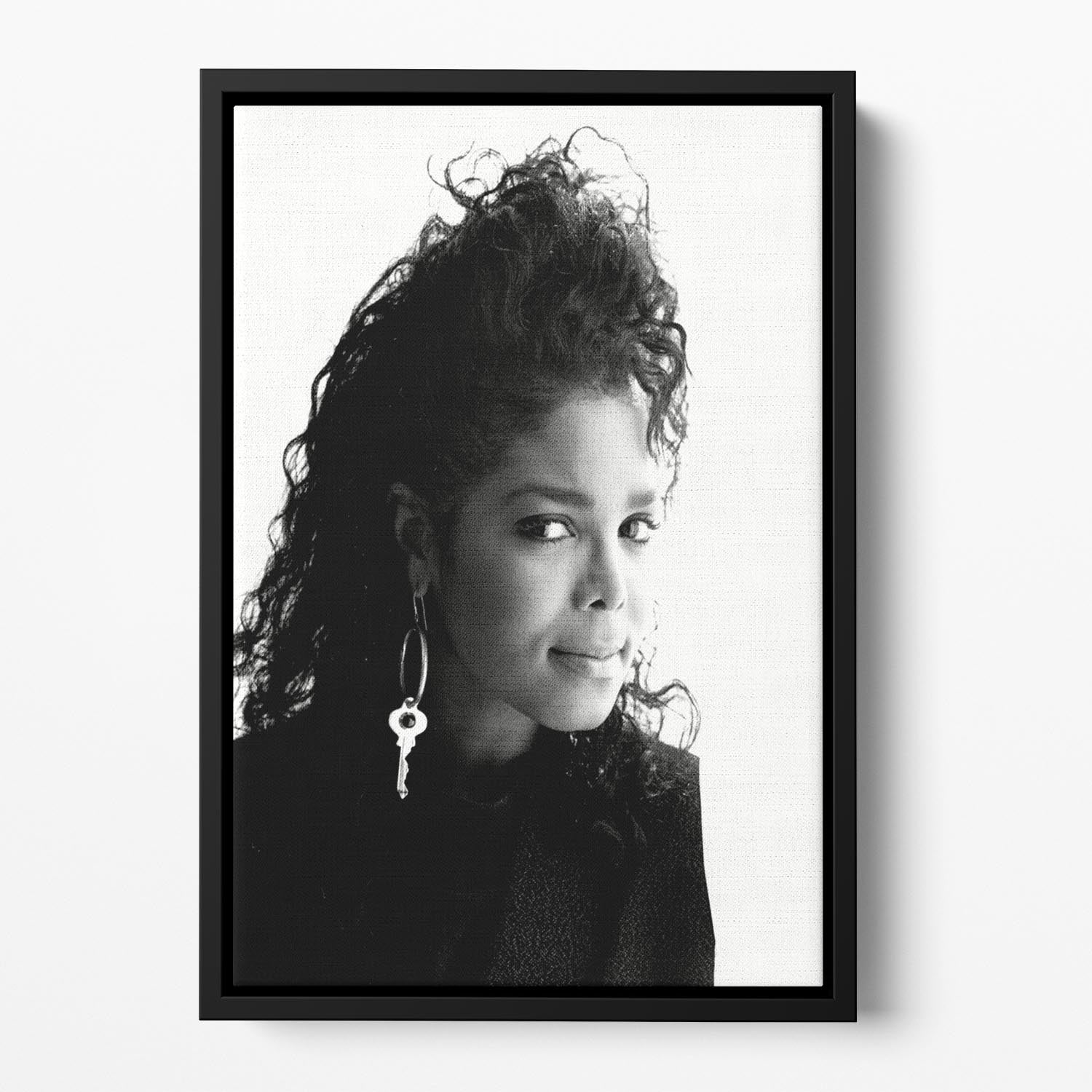 A vibrant abstract canvas featuring Janet Jackson from 1987, elegantly framed to create a floating effect.