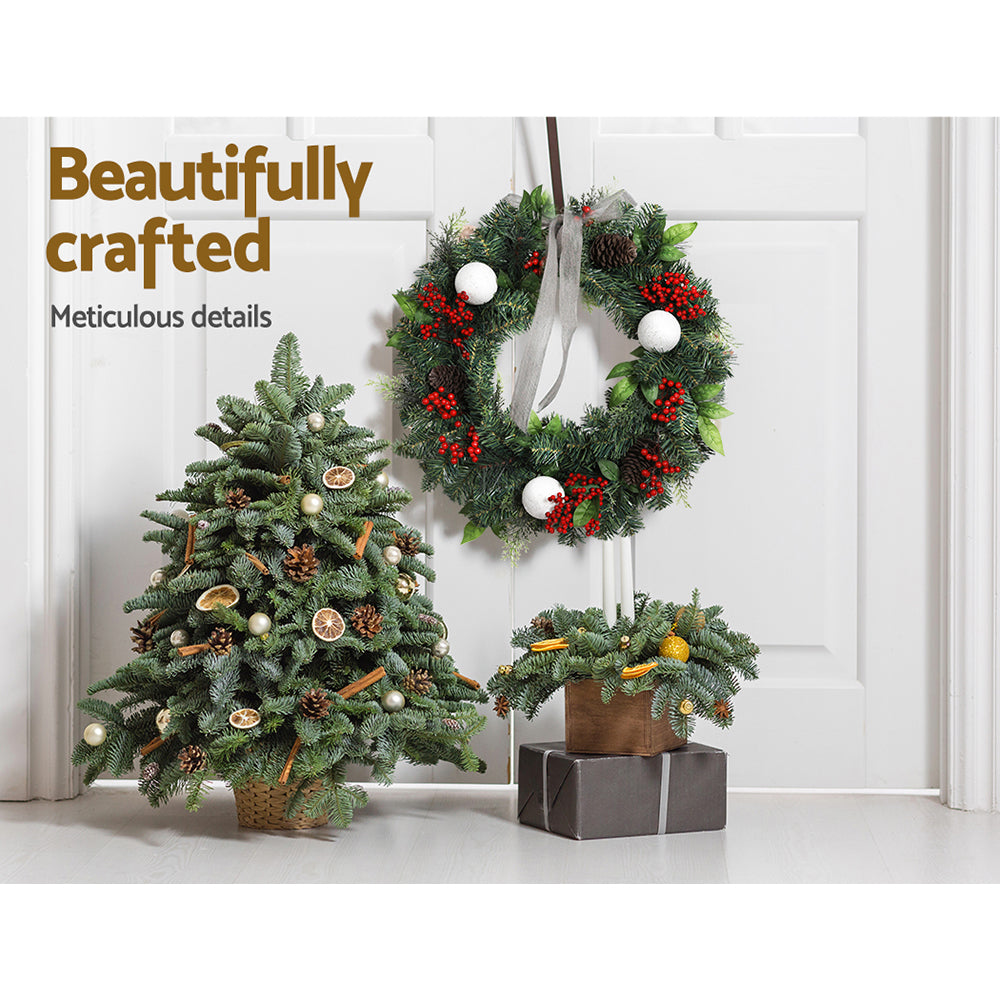 Jingle Jollys 2FT Christmas Wreath with warm LED lights, artificial berries, pinecones, and decorative balls, perfect for festive decoration.