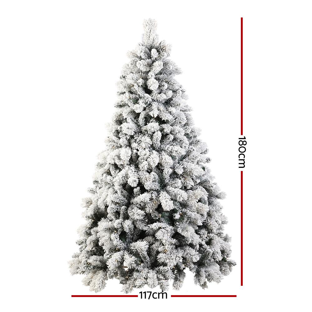 Jingle Jollys 1.8M Christmas Tree with 350 LED lights and snowy tips, showcasing its realistic appearance and lush design.