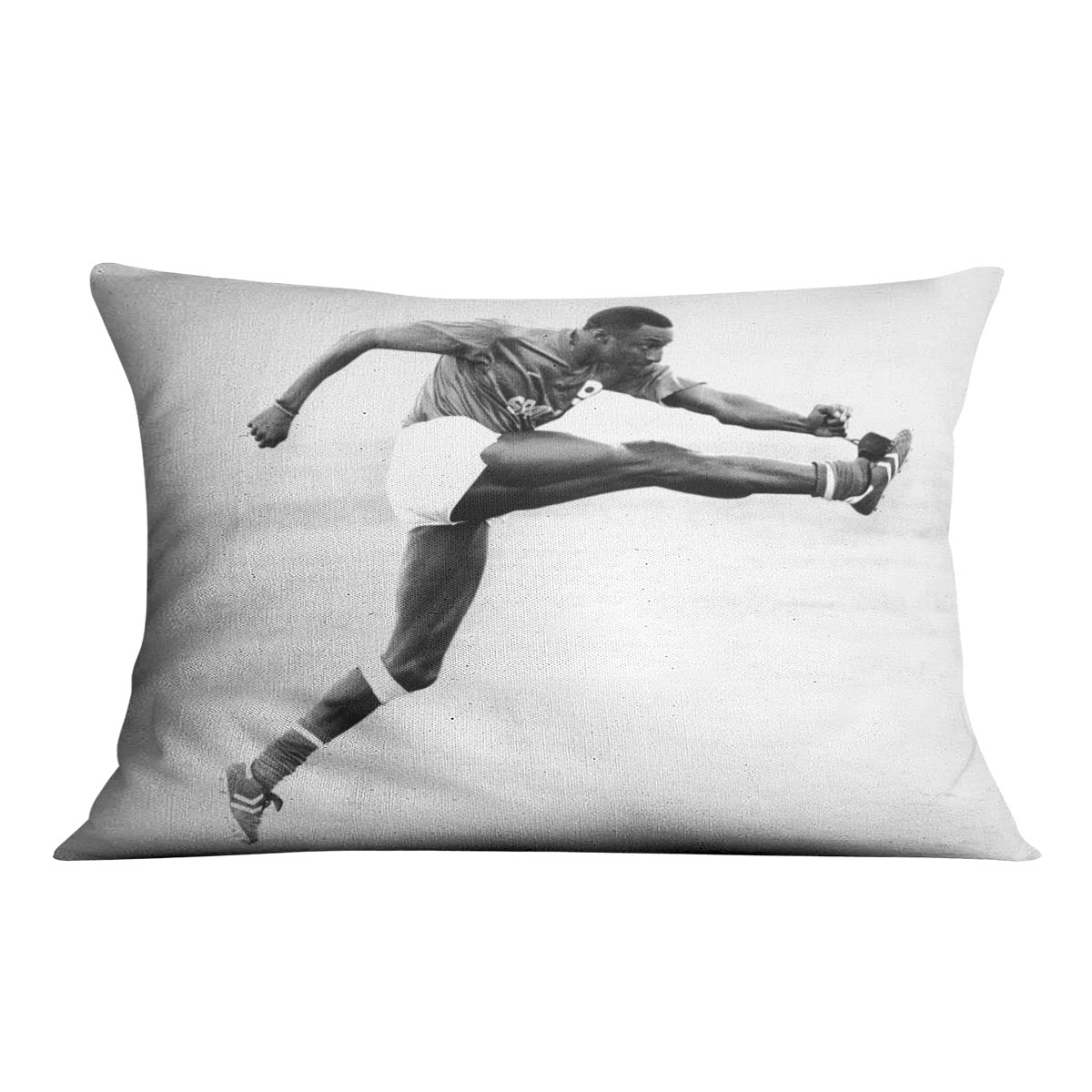 John Fashanu Cushion featuring vibrant abstract designs on luxurious vegan faux suede, showcasing its plush filling and handmade quality.