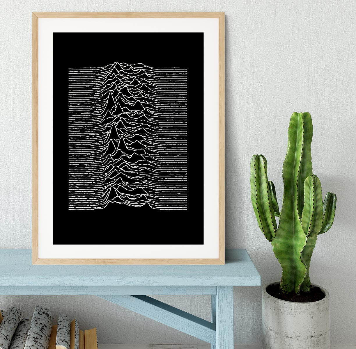 Joy Division Unknown Pleasures Framed Print showcasing vibrant colors and intricate details in a stylish frame.