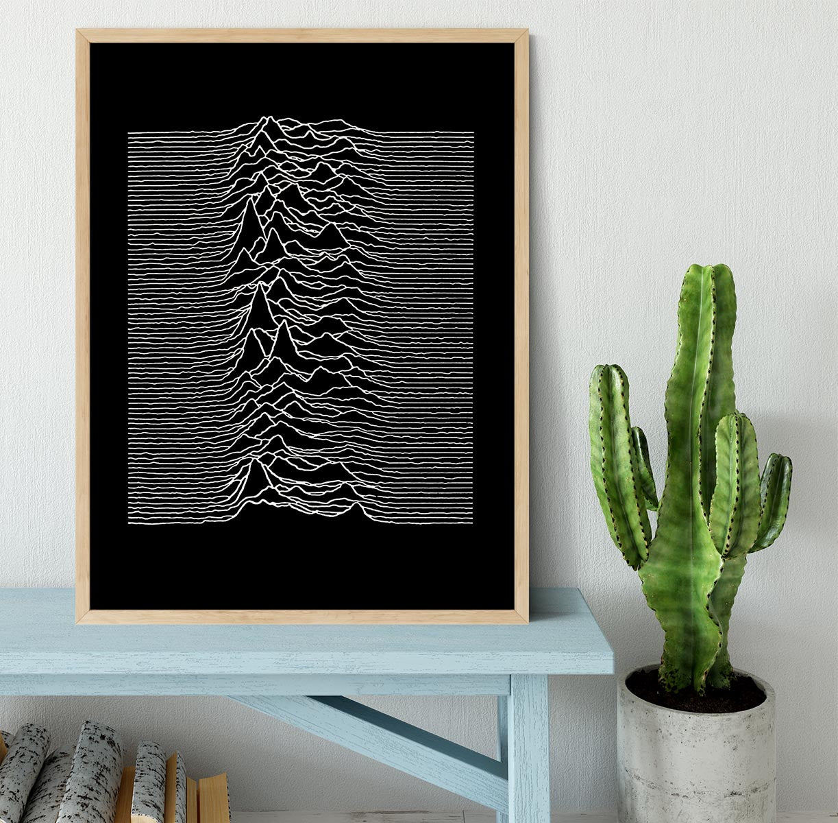 Joy Division Unknown Pleasures Framed Print showcasing vibrant colors and intricate details in a stylish frame.