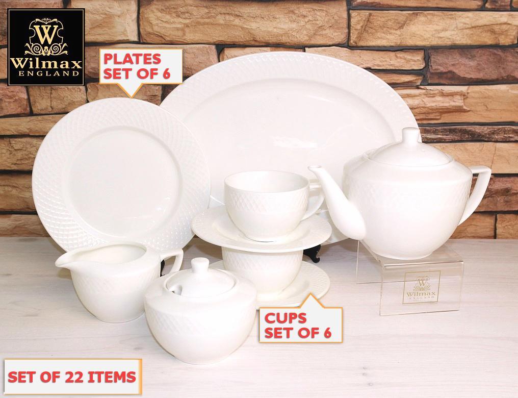 Julia Fine Dining 22 Piece Entertaining Set featuring elegant porcelain dinner plates, teacups, saucers, and a teapot, perfect for six diners.