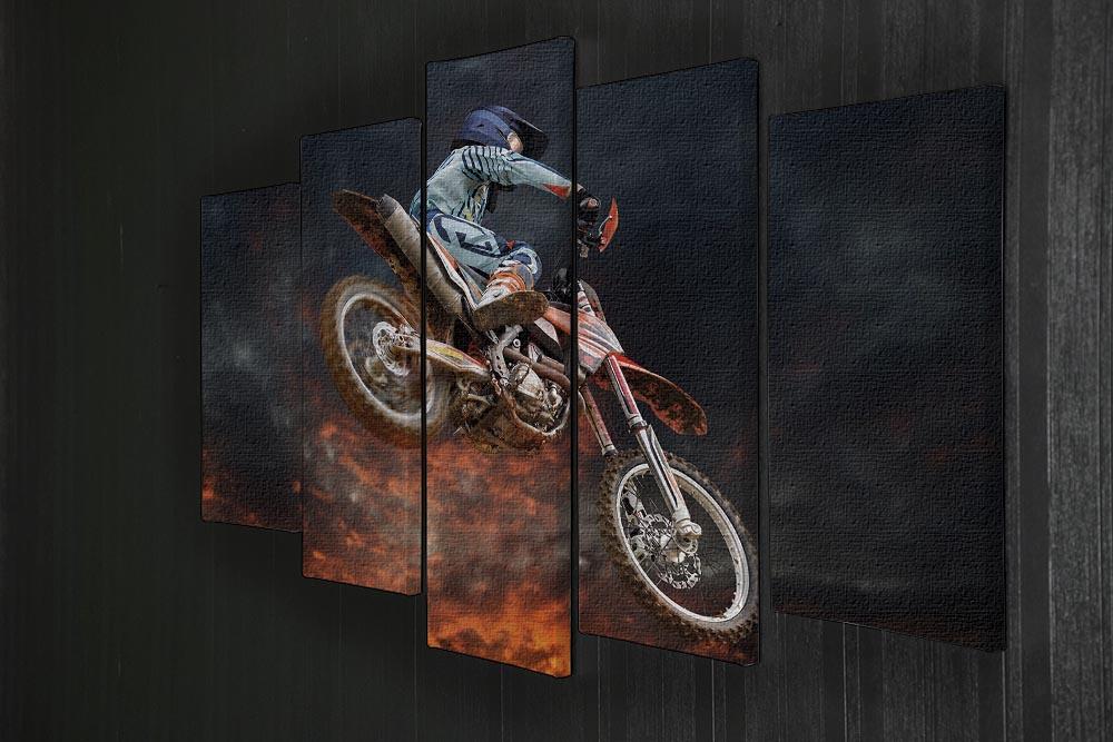 A dynamic 5-panel canvas artwork featuring a motocross rider in mid-jump, showcasing vibrant colors and action.