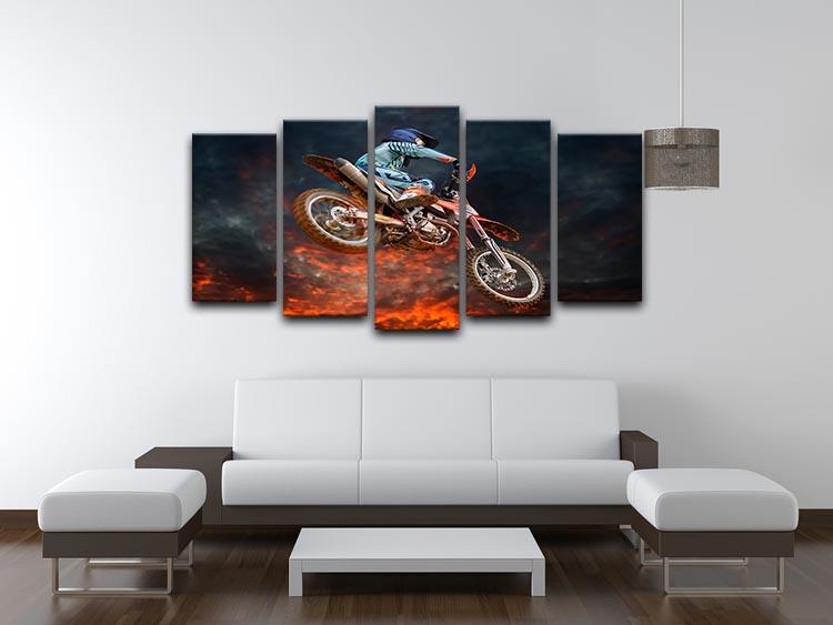 A dynamic 5-panel canvas artwork featuring a motocross rider in mid-jump, showcasing vibrant colors and action.
