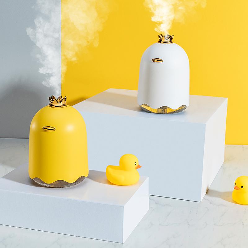 KBAYBO 250ml USB Mini Aroma Ultrasonic Cool Mist Humidifier in yellow, featuring a cartoon design and LED night light.