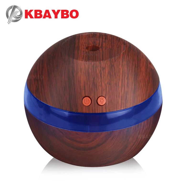 KBAYBO USB Ultrasonic Humidifier in brown color with mist and LED lights, showcasing its sleek design and functionality.