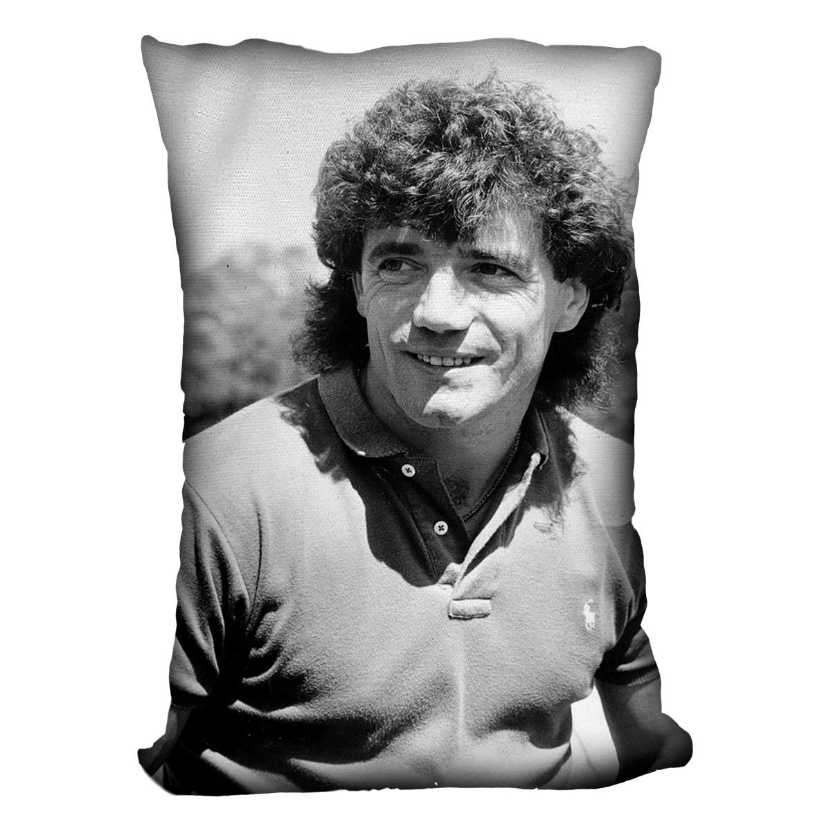 A vibrant Kevin Keegan Cushion featuring colorful abstract designs on luxurious vegan faux suede, perfect for home decor.