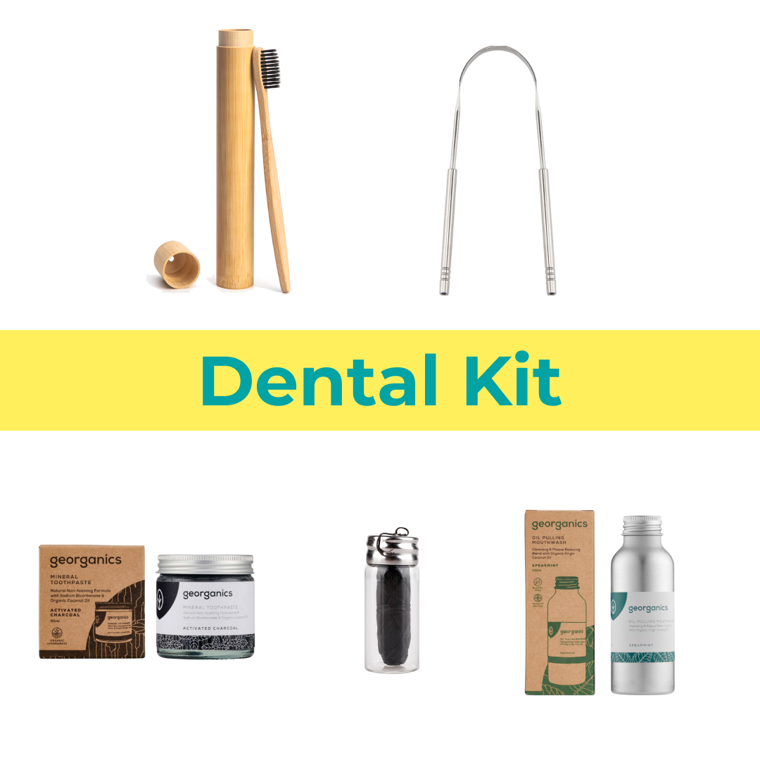 Kiwi Eco Box containing a bamboo toothbrush, bamboo case, tongue scraper, charcoal dental floss, natural toothpaste, and organic mouthwash, all plastic-free.