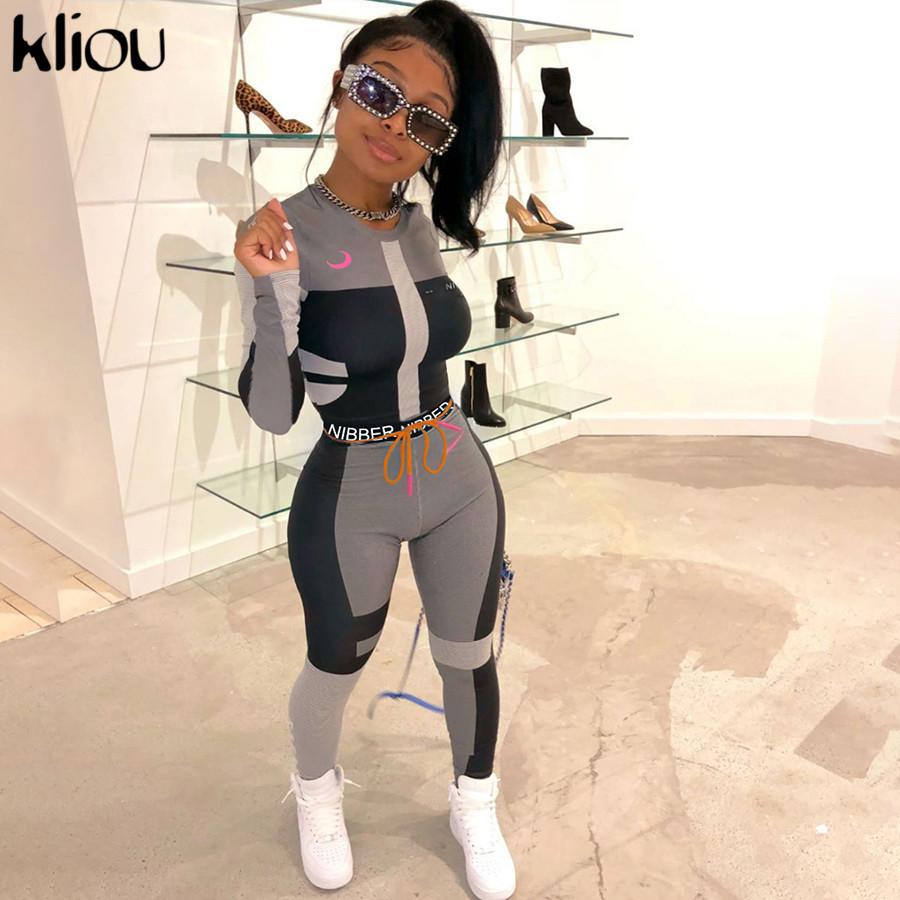 Kliou women's fitness two-piece tracksuit featuring a long sleeve crop top and elastic skinny leggings with letter print design.