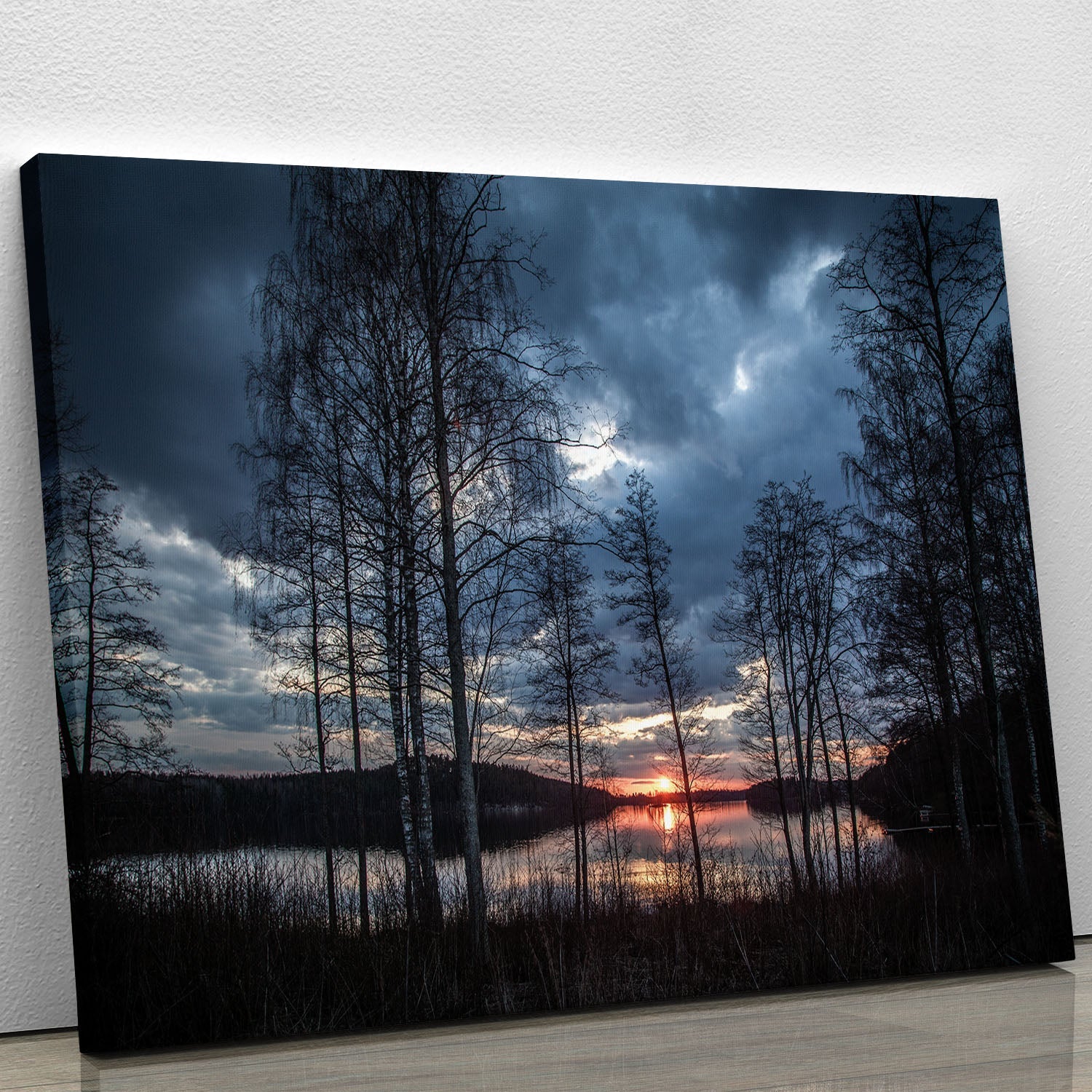 A beautiful lake sunset canvas print showcasing vibrant colors reflecting on water, perfect for home decor.