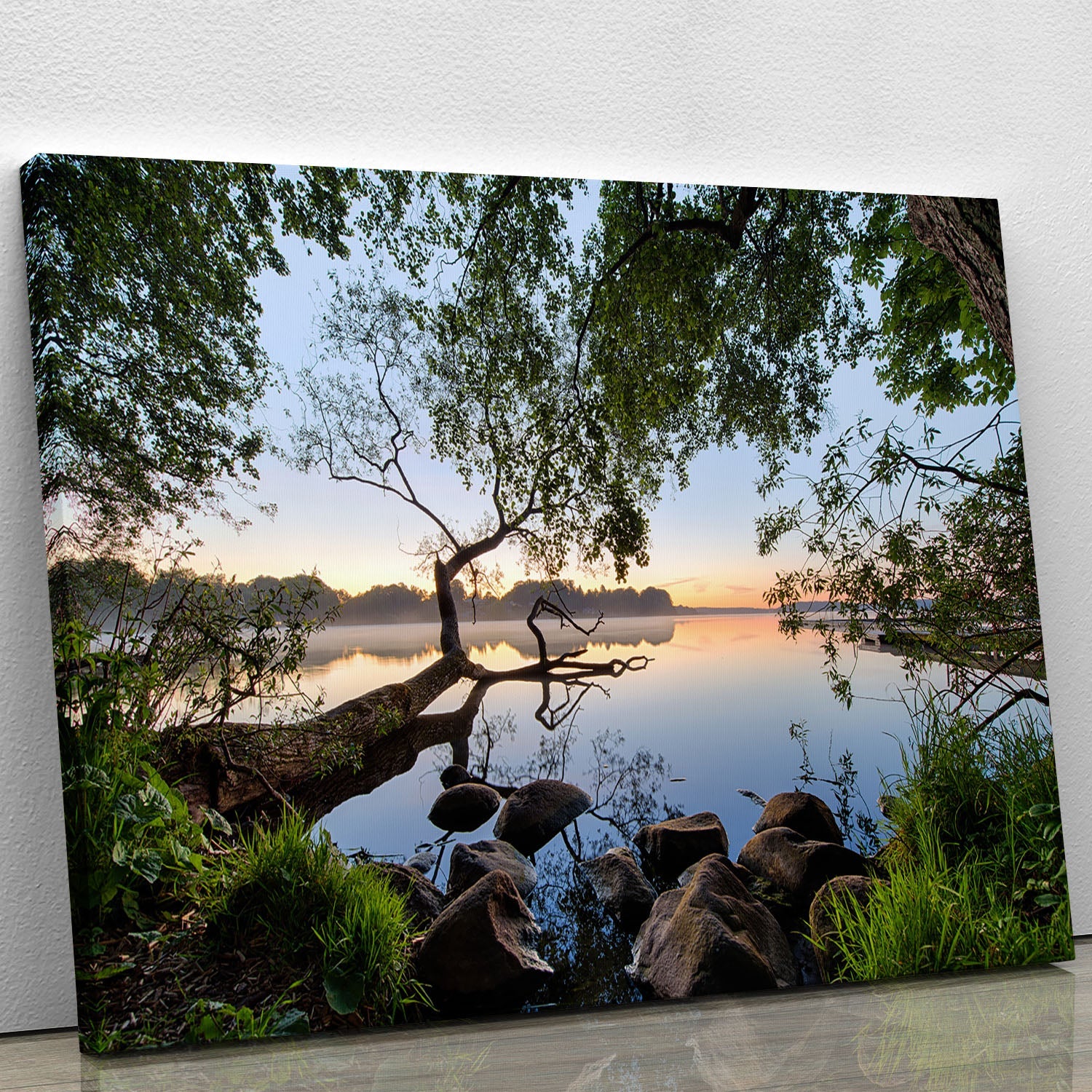 A beautiful lake view canvas print showcasing serene waters and lush greenery, perfect for home decor.