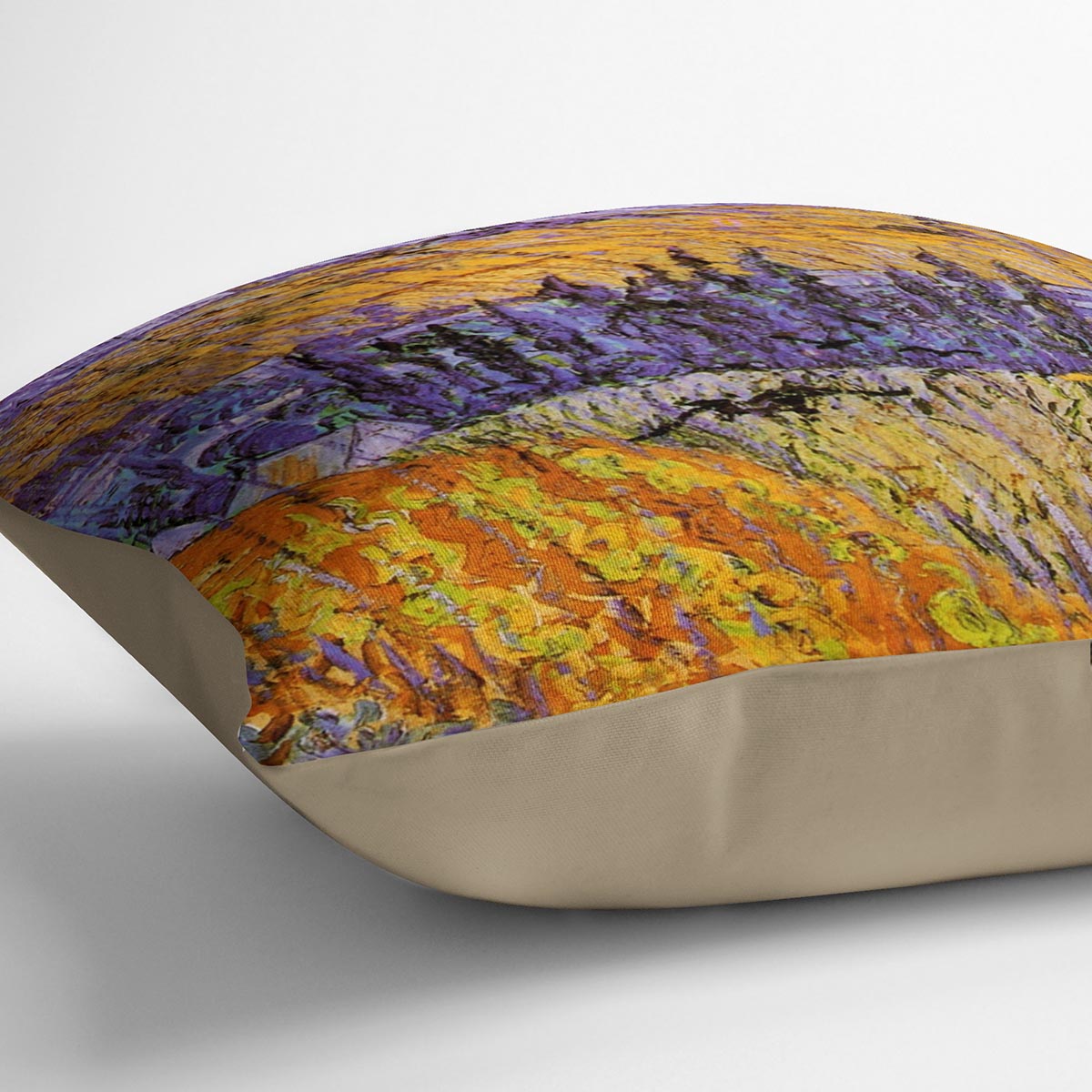 A vibrant cushion featuring Van Gogh's Landscape at Auvers in the Rain design, made from luxurious vegan faux suede.