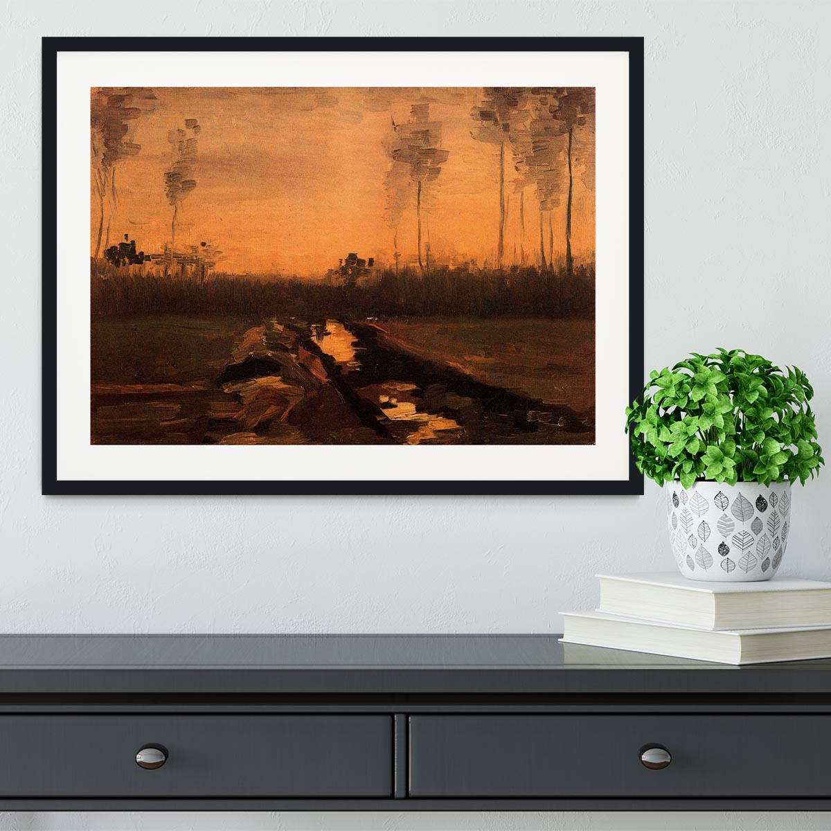 Framed print of Van Gogh's Landscape at Dusk, showcasing vibrant colors and intricate details in a handmade frame.