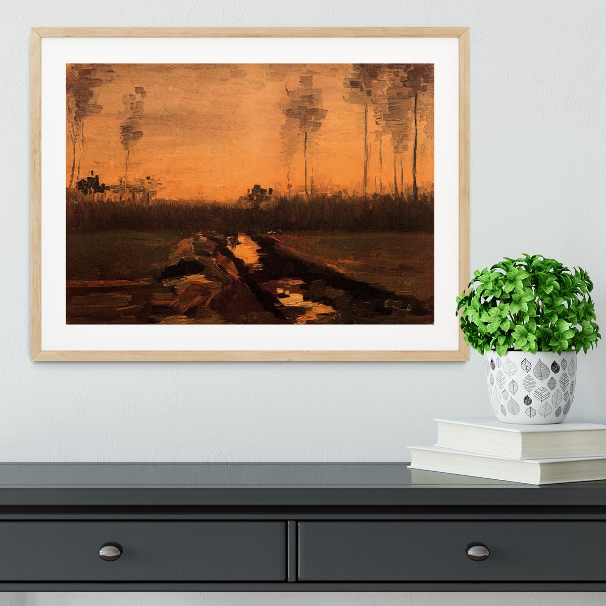 Framed print of Van Gogh's Landscape at Dusk, showcasing vibrant colors and intricate details in a handmade frame.