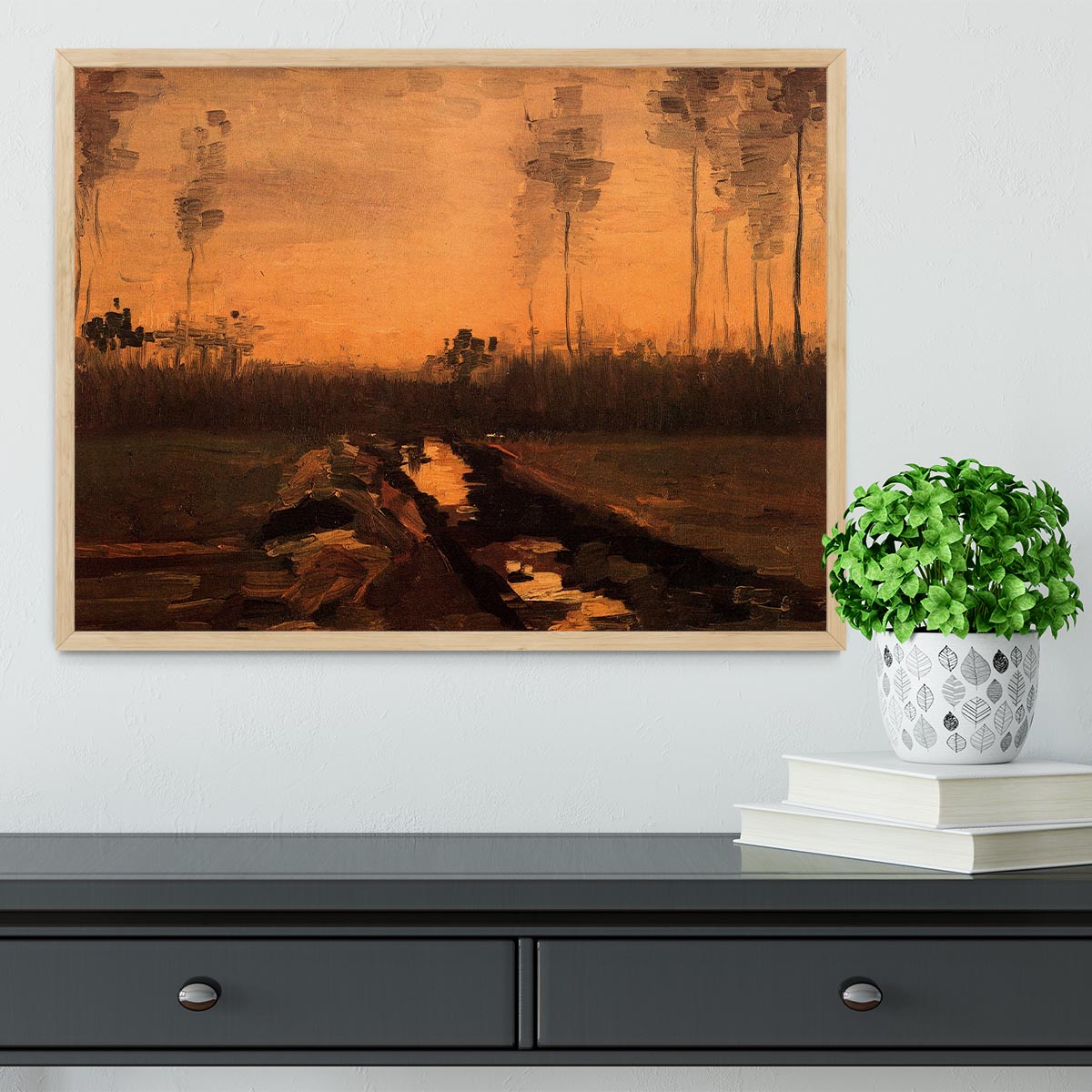 Framed print of Van Gogh's Landscape at Dusk, showcasing vibrant colors and intricate details in a handmade frame.