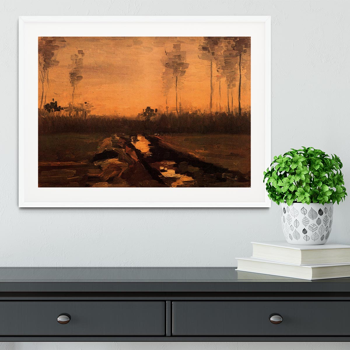 Framed print of Van Gogh's Landscape at Dusk, showcasing vibrant colors and intricate details in a handmade frame.