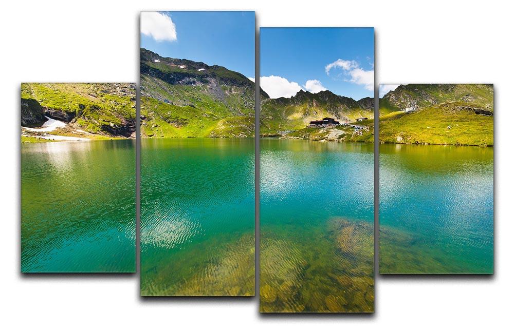 A beautiful 4-split canvas artwork depicting the serene landscape of Balea Lake, showcasing vibrant colors and natural beauty.