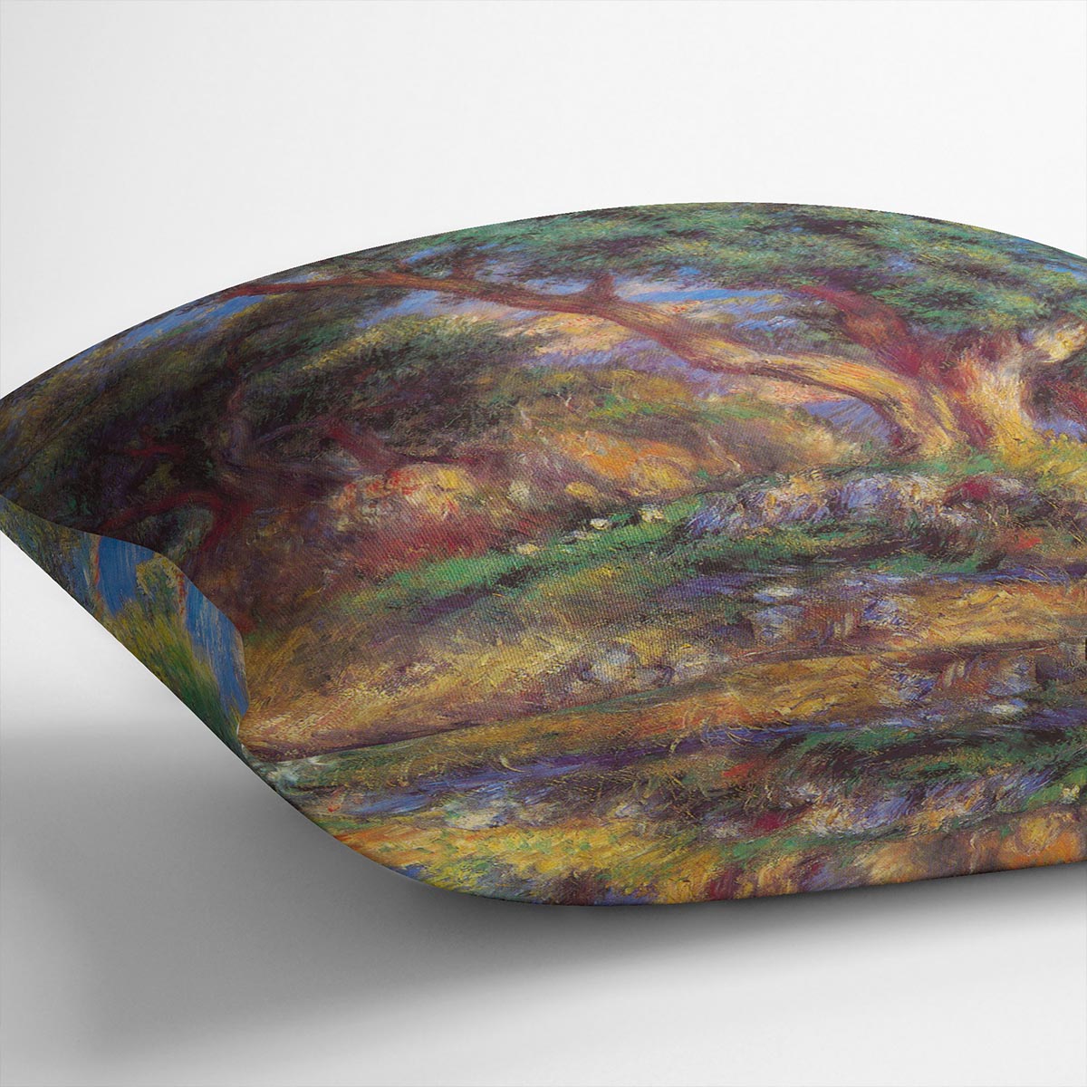 A vibrant cushion featuring the Landscape in Menton by Renoir design, made from luxurious vegan faux suede, showcasing rich colors and abstract patterns.