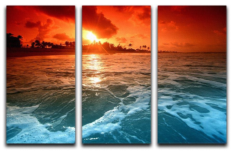 A stunning 3-panel canvas print depicting a vibrant ocean sunrise, perfect for home decor.