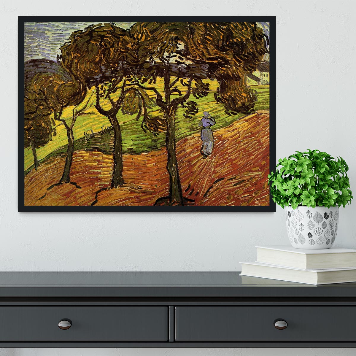 Framed print of Van Gogh's Landscape with Trees and Figures, showcasing vibrant colors and intricate details in a stylish frame.