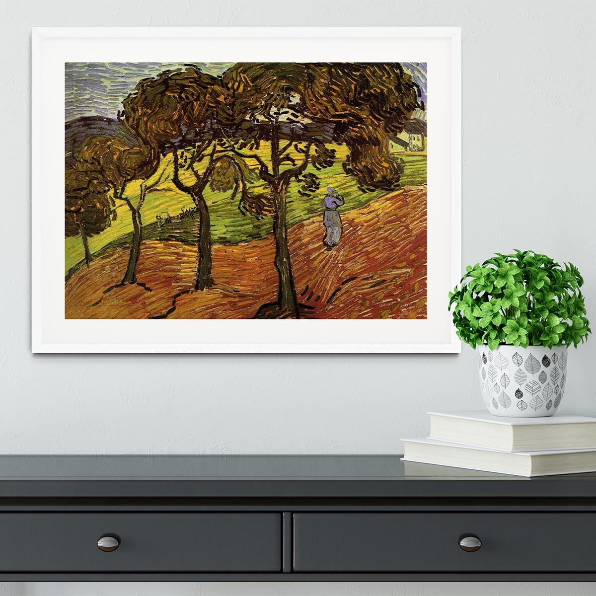 Framed print of Van Gogh's Landscape with Trees and Figures, showcasing vibrant colors and intricate details in a stylish frame.
