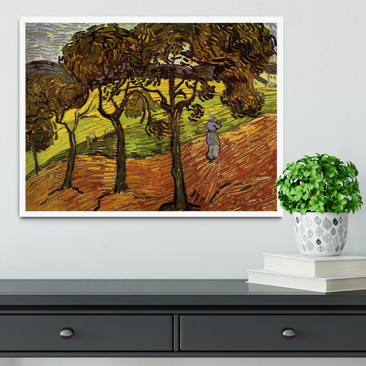 Framed print of Van Gogh's Landscape with Trees and Figures, showcasing vibrant colors and intricate details in a stylish frame.