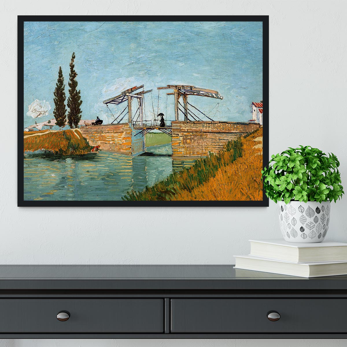 Framed print of Langlois Bridge by Van Gogh, showcasing vibrant colors and intricate details in a stylish frame.