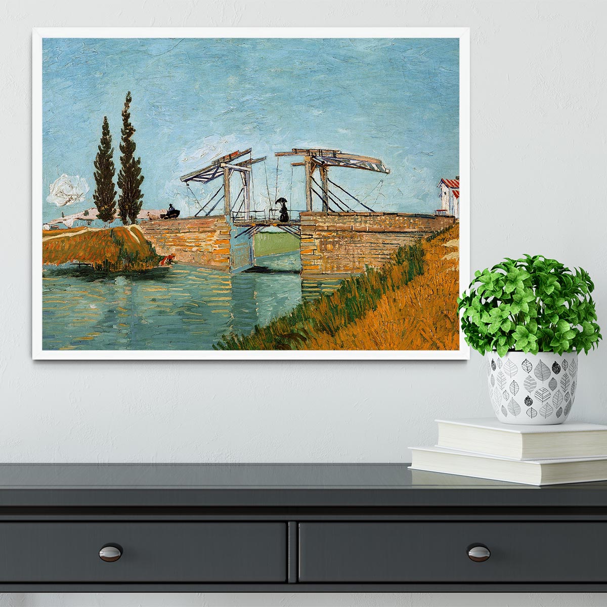 Framed print of Langlois Bridge by Van Gogh, showcasing vibrant colors and intricate details in a stylish frame.