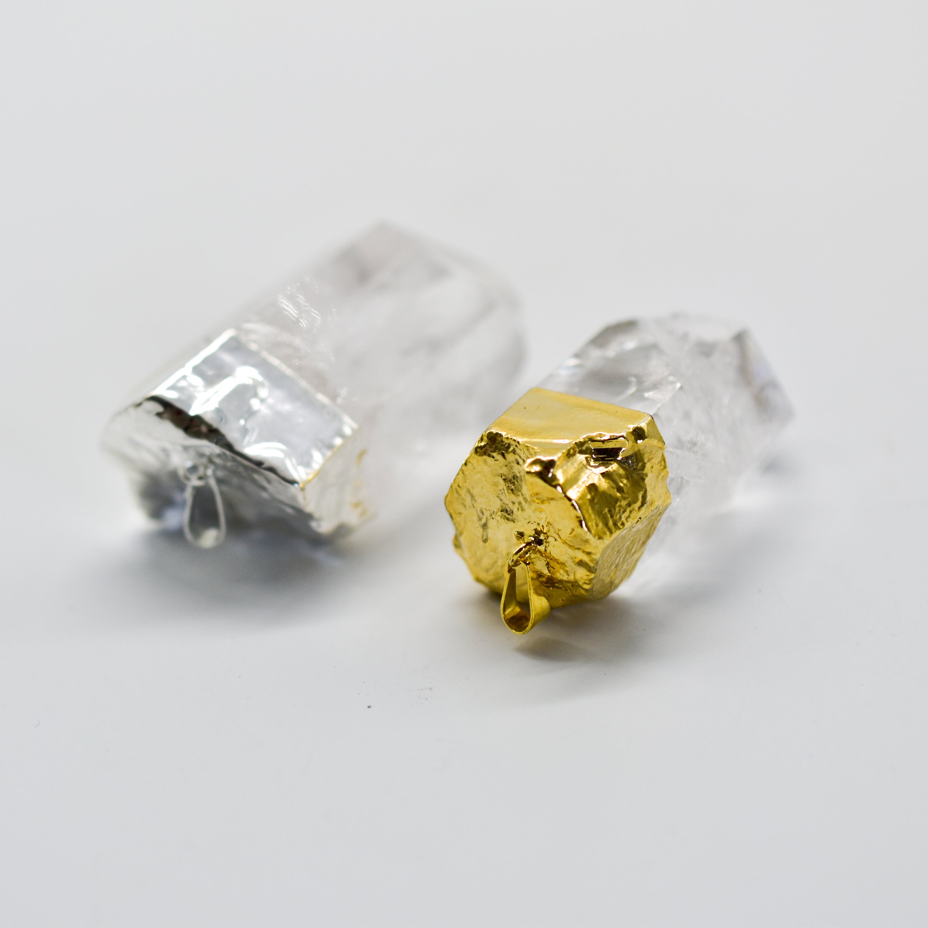 Large Single Crystal Point Pendant in gold or silver plating, showcasing a natural quartz crystal with a unique shape and shine.