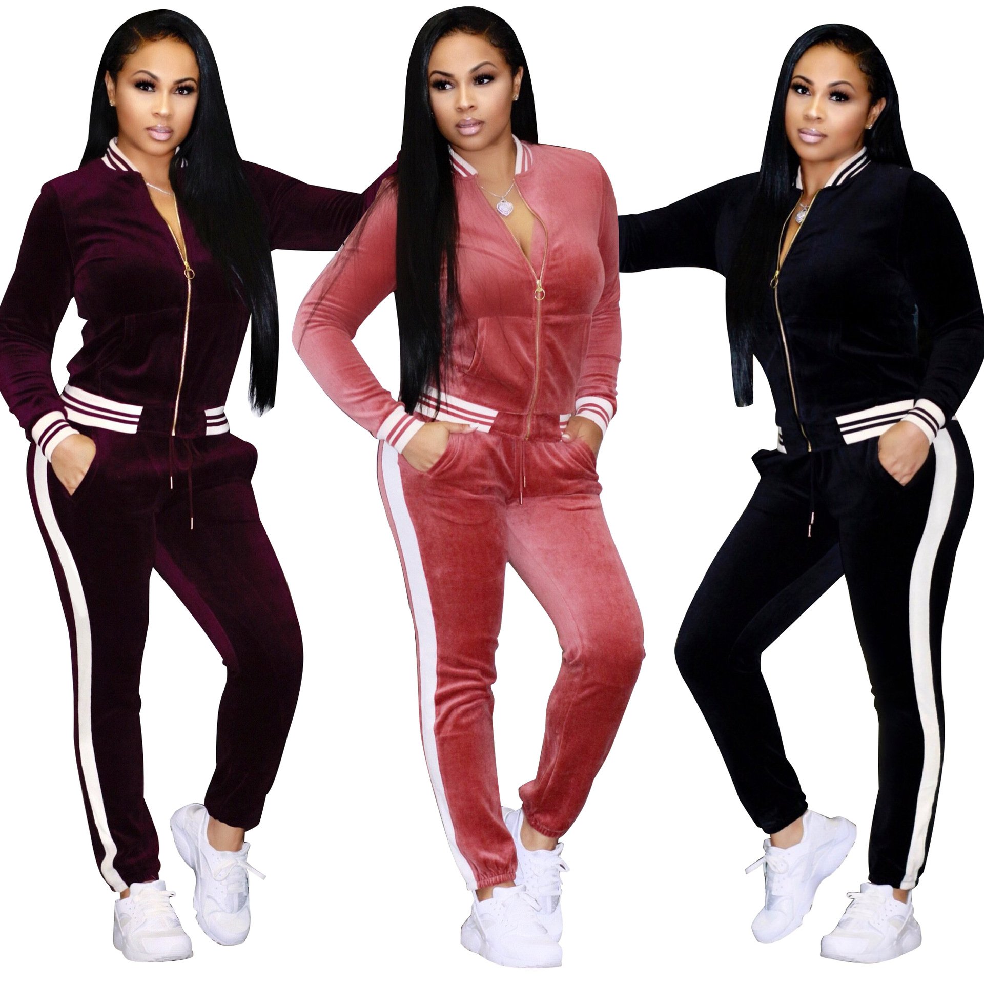 Large size women sport wear tracksuit featuring a stand collar, long sleeves, and ankle-length pants, designed for comfort and style.