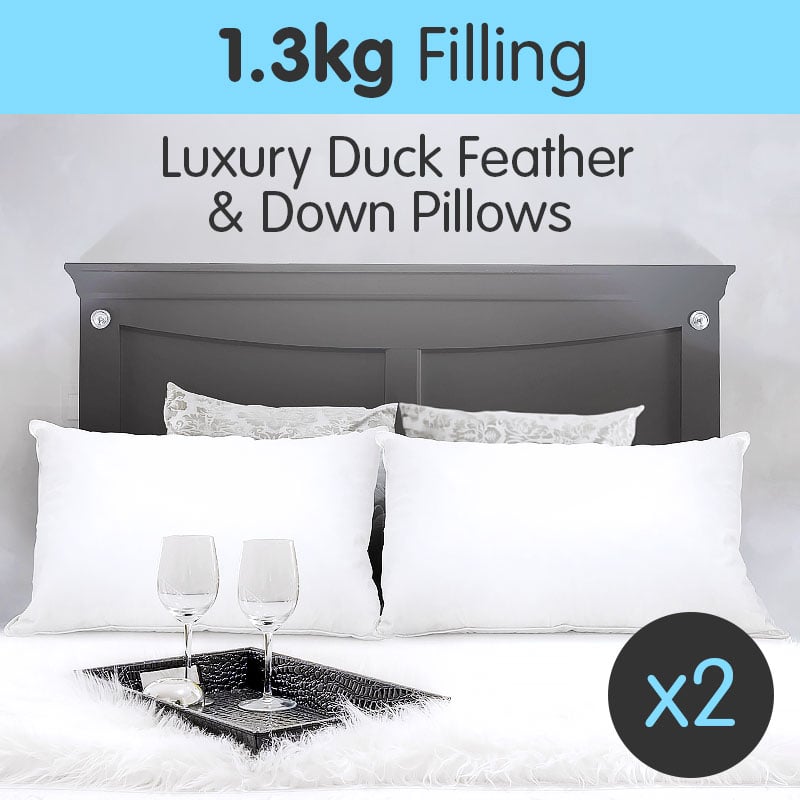 Laura Hill Duck Down Feather Pillow Twin Set featuring two luxurious white pillows made of 95% duck feather and 5% duck down, ideal for comfort and support.